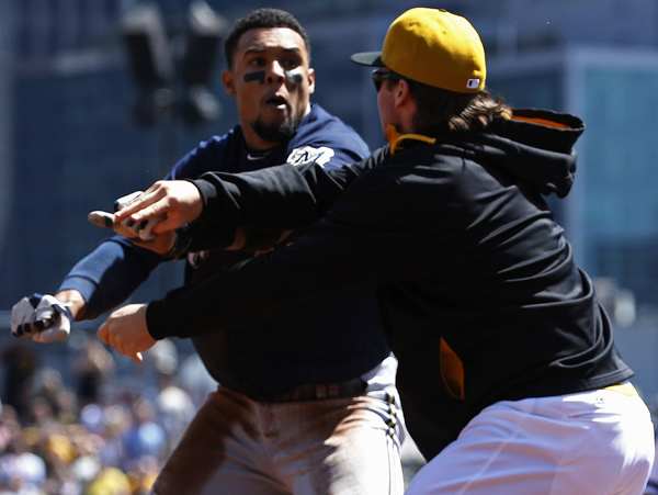 Carlos Gomez and Travis Snider were both suspended for fighting in last Sunday's game. (Gene J. Puskar/AP)